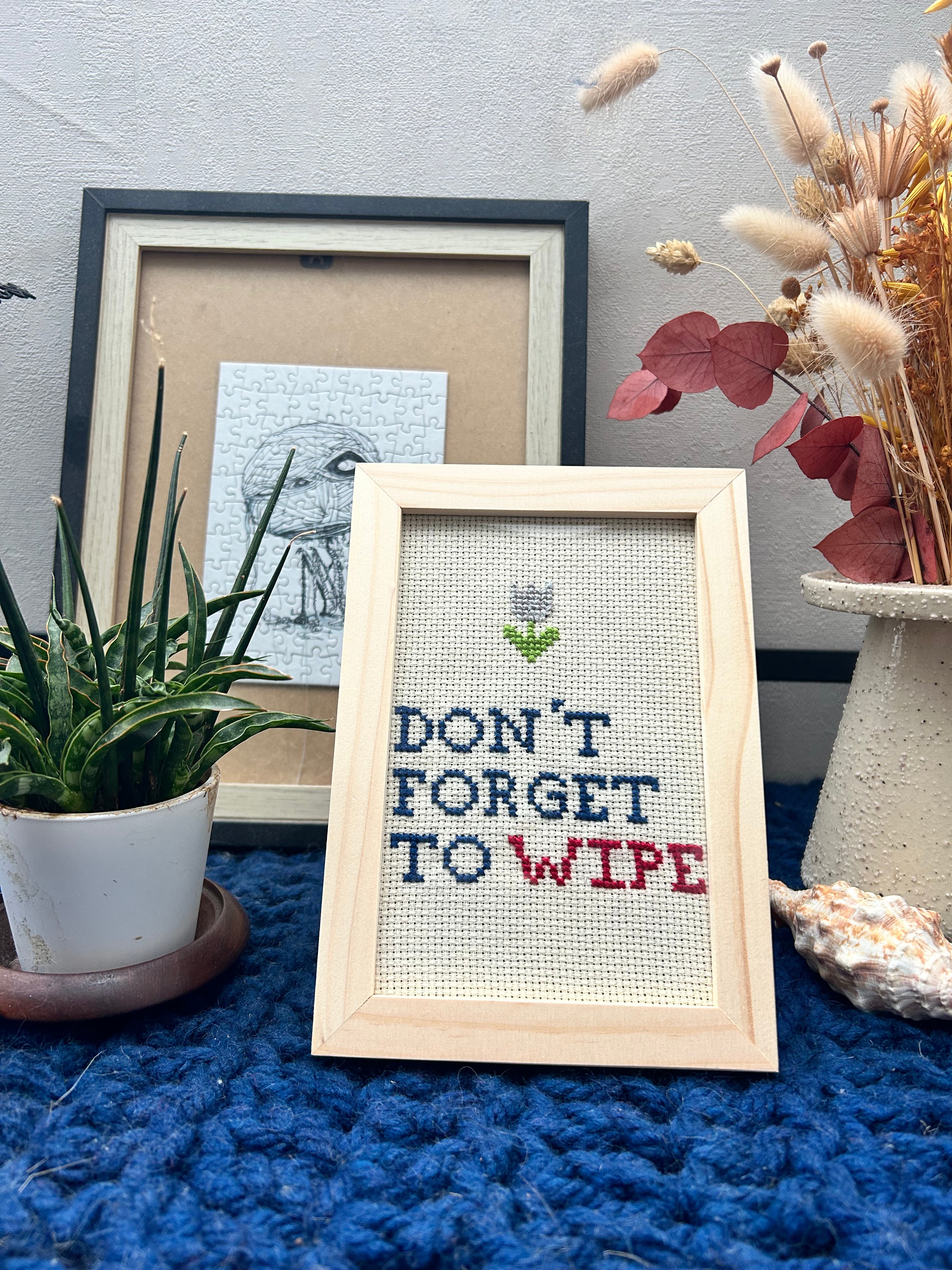 Cadre en bois brodé au point de croix