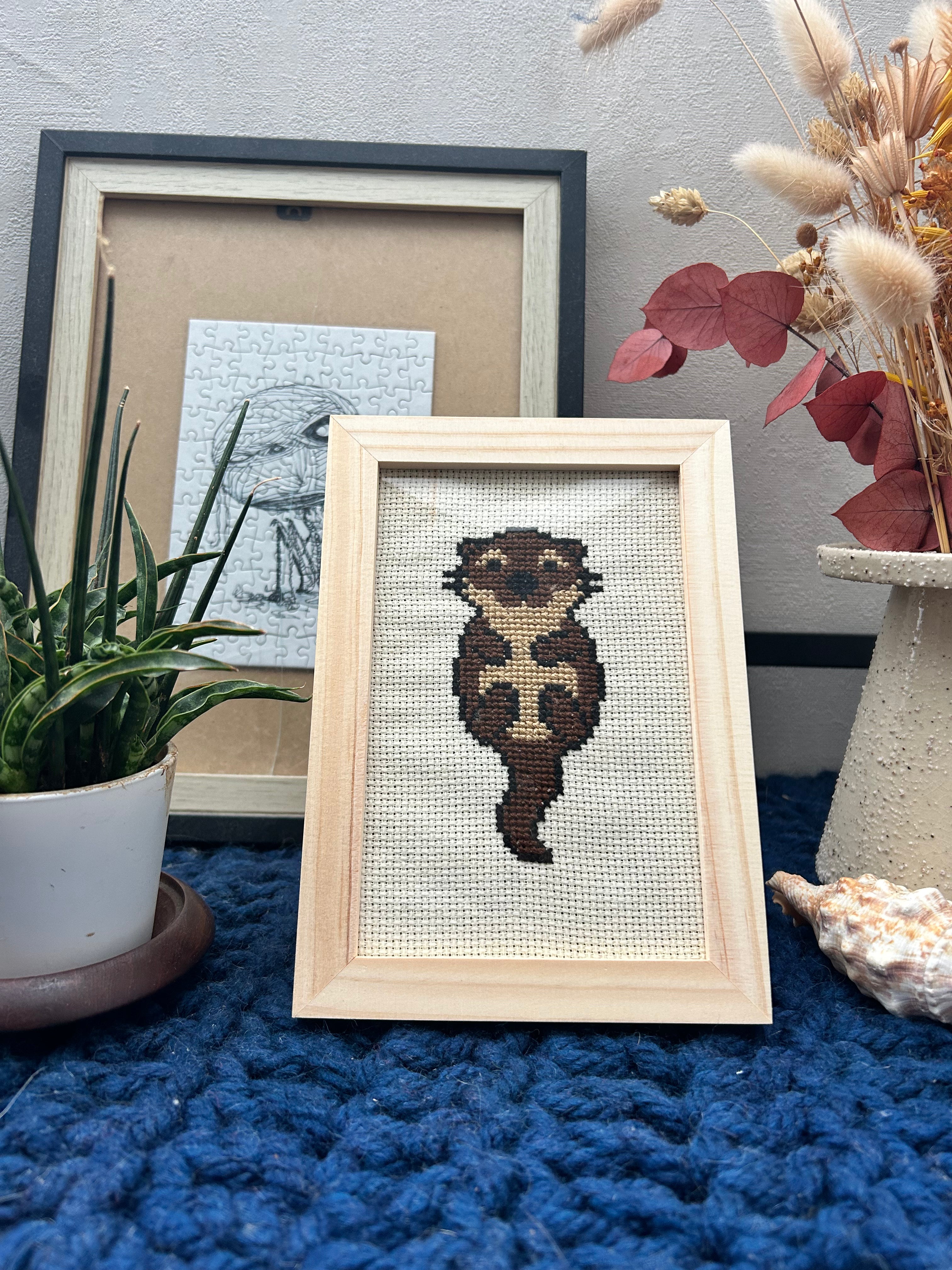 Cadre en bois brodé au point de croix